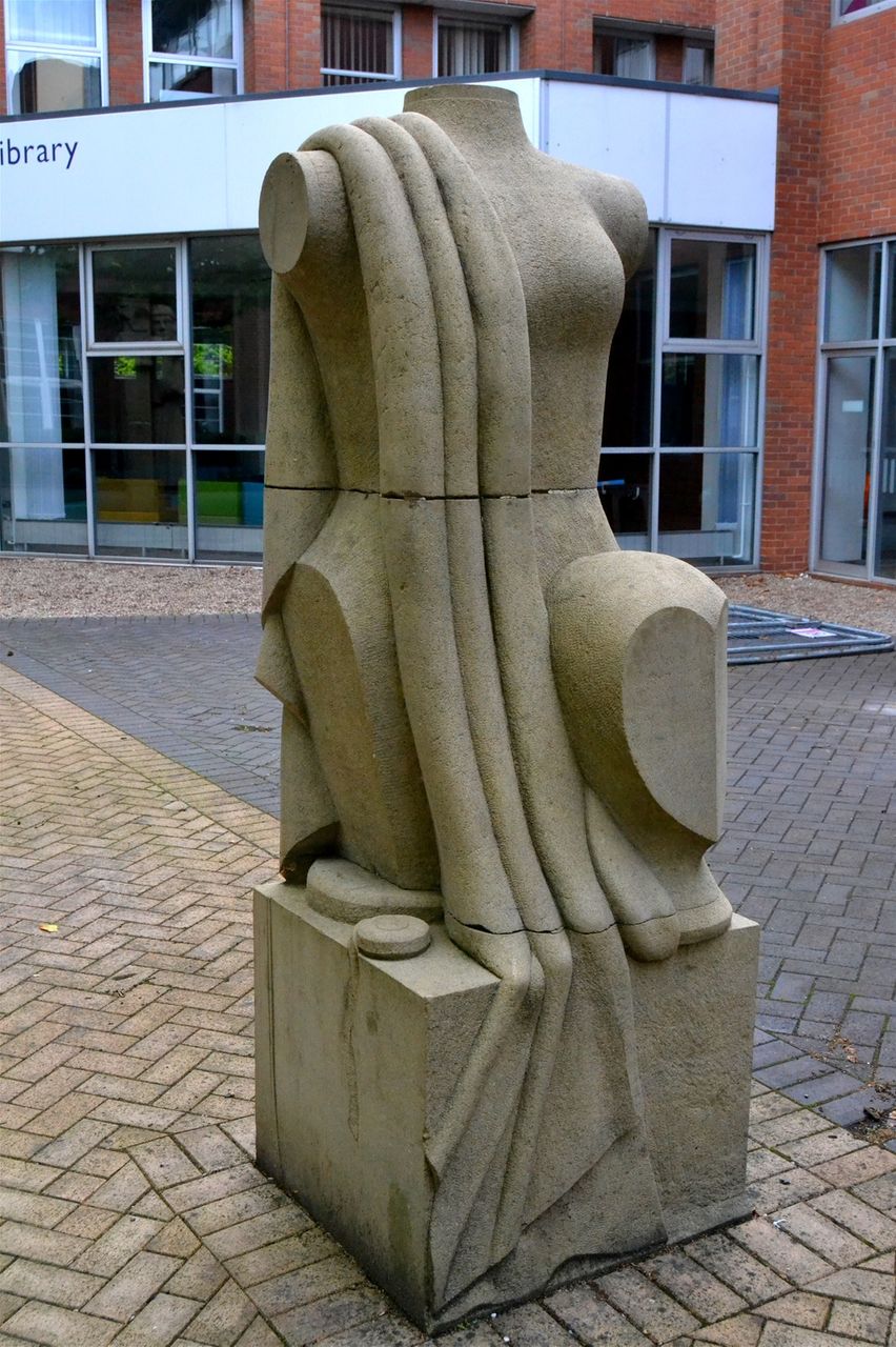 The Broadway. In courtyard of College Objects of technology in York stone designed by Steve Field, sculpted by John Vaughan