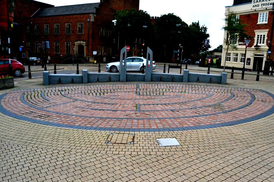 Priory st, Maze of cobbles designed by Steve Field and granite seat by Pete Whitehouse