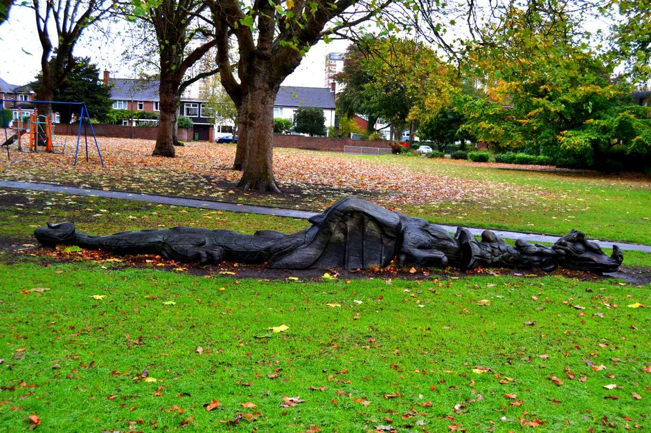 Dragon in Greenfield gardens. designed by Steve Field, carved by Graham Jones and Robot Cossey